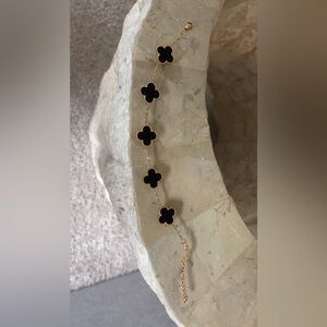 Clover black and gold bracelet